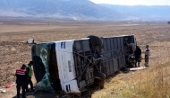 This handout photograph taken and released by the Demiroren News Agency (DHA) on October 17, 2024, shows an tour bus which was carrying Japanese tourists onboard after it overturned near Afyonkarahisar western Turkiye. Photo by Demiroren News AAgency / DHA (Demiroren News Agency