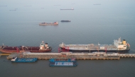 An aerial view of oil tankers moored at an oil storage terminal in Taicang, China.