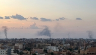 Smoke billows during air strikes in central Khartoum as the Sudanese army attacks positions held by the paramilitary Rapid Support Forces (RSF) throughout the Sudanese capital on October 12, 2024. Fierce fighting has raged since October 11 around Khartoum, much of which is controlled by the RSF, with the military pounding the centre and south of the city from the air. Photo by AFP.
