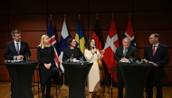 German Foreign Minister Annalena Baerbock (3rd R) speaks with with her counterparts in Berlin on October 21, 2024. Photo by RALF HIRSCHBERGER / AFP.