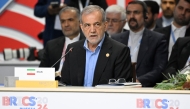 Iran's President Masoud Pezeshkian attends the extended format meeting of the BRICS summit in Kazan on October 23, 2024. Photo by Alexander NEMENOV / POOL / AFP.