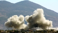 Smoke rises from the site of an Israeli airstrike that targeted the southern Lebanese village of Khiam on October 24, 2024. (Photo by AFP)
