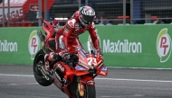 Ducati Lenovo Team's Italian rider Enea Bastianini celebrates winning the Sprint race of the MotoGP Thailand Grand Prix at the Buriram International Circuit in Buriram on October 26, 2024. (Photo by Lillian SUWANRUMPHA / AFP)
 