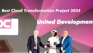 A UDC official receiving the award during the Middle East Enterprise AI & Analytics Summit and Awards held at Marsa Malaz Kempinski, The Pearl Island. 