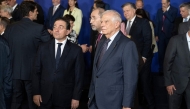 European Union High Representative for Foreign Affairs and Security Policy Josep Borrell (C), and Spain's Minister of Foreign Affairs Jose Manuel Albares (L) look on as members gather for a family photo at the start of the 9th regional forum of the Union for the Mediterranean (UfM), in Barcelona on October 28, 2024. (Photo by Josep Lago / AFP)