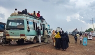 People displaced from eastern areas of Sudan's al-Jazira state arrive to Gedaref city on October 27, 2024. (Photo by AFP)