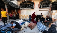 Palestinians mourn over the bodies of relatives after an Israeli strike in Beit Lahia, in the northern Gaza Strip, on October 29, 2024. Photo by AFP.