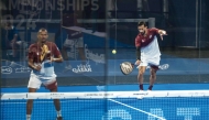 Qatar players in action during their tie against Uruguay.