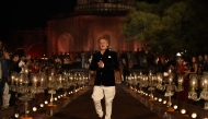 Archival photo used for demonstration purposes. Indian designer Rohit Bal walks on the catwalk during the Grand Finale of the Wills Lifestyle Indian Fashion Week Spring/Summer 2015 Collection in New Delhi on October 12, 2014. Photo by Sajjad HUSSAIN / AFP.