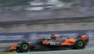 McLaren's British driver Lando Norris races during the qualifying session for the Formula One Sao Paulo Grand Prix, at the Jose Carlos Pace racetrack, aka Interlagos, in Sao Paulo, Brazil, on November 3, 2024. (Photo by NELSON ALMEIDA / AFP)