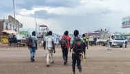 People displaced from eastern areas of Sudan's al-Jazira state arrive to Gedaref city on October 27, 2024. At least 50 people have been killed in a single attack by Sudanese paramilitaries who have besieged and raided villages in al-Jazira state, activists said. (Photo by AFP)