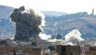 Smoke rises following an Israeli airstrike that targeted the eastern Lebanese city of Baalbeck on November 3, 2024. (Photo by Nidal Solh / AFP)