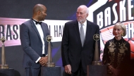 2023 inductees Tony Parker and Gregg Popovich react on stage during the 2023 Naismith Basketball Hall of Fame Induction at Symphony Hall on August 12, 2023 in Springfield, Massachusetts. Mike Lawrie/Getty Images/AFP (Photo by Mike Lawrie / GETTY IMAGES NORTH AMERICA / Getty Images via AFP)

