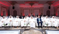 Minister of Finance H E Ali bin Ahmed Al Kuwari with other dignitaries during the summit, yesterday.