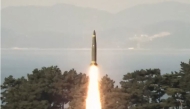 An handout photo taken on November 7, 2024, and provided by South Korean Defence Ministry on November 8, 2024 shows a Hyunmoo-2 surface-to-surface short-range missile being launched into the West Sea. (Photo by Handout / South Korean Defence Ministry / AFP)