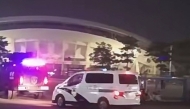 This image grab from a UGC video posted on November 11, 2024 shows emergency vehicles arriving after a driver ploughed through a crowd of people exercising at a sports center in Zhuhai, in south China's Guangdong province. Photo by UGC / AFP