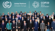 Participating world leaders and delegates pose for a family photo during the United Nations Climate Change Conference (COP29) in Baku on November 12, 2024. Photo by Alexander NEMENOV / AFP.