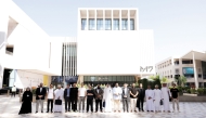 Applicants pose for a photo in Msheireb, Doha.