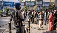 A Somaliand police officer monitors the queues in front of a polling station during the 2024 Somaliland presidential election in Hargeisa on November 13, 2024. Somaliland, a breakaway region of Somalia, holds a presidential election on November 13, 2024 at a time of diplomatic tensions in the Horn of Africa. (Photo by LUIS TATO / AFP)
