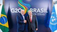 Handout picture released by the Brazilian Presidency showing President Luiz Inácio Lula da Silva (L) shaking hands with UN General Secretary Antonio Guterres during a meeting in Rio de Janeiro, Brazil, on November 16, 2024, ahead of the G20 Summit. Photo by Ricardo STUCKERT / Brazilian Presidency / AFP.