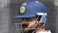 India's Virat Kohli prepares to bat during a practice session at the Optus Stadium in Perth on November 20, 2024. (Photo by Saeed Khan / AFP) 