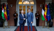 Spain's Prime Minister Pedro Sanchez (right) shakes hands with Palestinian prime minister Mohammad Mustafa before their meeting at the Moncloa Palace in Madrid, on November 21, 2024. (Photo by Oscar Del Pozo / AFP)