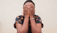 File: A woman infected with Mpox poses for a photograph at the Kamenge University Hospital's Mpox treatment center in Bujumbura on August 22, 2024. (Photo by Tchandrou Nitanga / AFP)