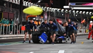 The car of Franco Colapinto of Argentina and Williams is returned to the pitlane after a crash during qualifying ahead of the F1 Grand Prix of Las Vegas at Las Vegas Strip Circuit on November 22, 2024 in Las Vegas, Nevada. Rudy Carezzevoli/Getty Images/AFP