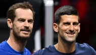 (FILES) (L-R) Britain's Andy Murray and Serbia's Novak Djokovic with (unseen) Switzerland's Roger Federer and Spain's Rafael Nadal pose during a Team Europe practice session ahead of the 2022 Laver Cup at the O2 Arena in London on September 22, 2022. (Photo by Glyn KIRK / AFP)
