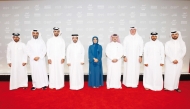 Chairman of Qatar Tourism Saad bin Ali Al Kharji (fourth left); CEO of DFI Fatma Hassan Alremaihi (centre); and other officials at the festival. 