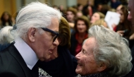 German fashion designer Karl Lagerfeld (L) meets Eliane Heilbronn, mother of the main Chanel shareholder, at the Institute of Political Studies (IEP) or 