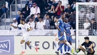 Al Sadd's Paulo Otavio (left) celebrates after scoring the equaliser.