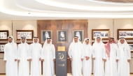 Managing Director of Commercial Bank Omar Hussain Alfardan with other officials during the event.