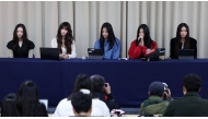 South Korean K-pop girl group NewJeans members (L-R) Haerin, Danielle, Minji, Hanni and Hyein attend a press conference in Seoul on November 28, 2024. Photo by YONHAP / AFP