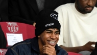 Barcelona's Spanish forward #19 Lamine Yamal injured is pictured in the stands prior the UEFA Champions League, league phase day 5 football match between FC Barcelona and Stade Brestois 29 (Brest) at the Estadi Olimpic Lluis Companys in Barcelona, on November 26, 2024. Photo by Josep LAGO / AFP.