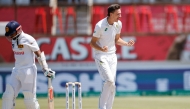 South Africa's Marco Jansen (R) celebrates after dismissing Sri Lanka's Vishwa Fernando (L) during the fourth day of the first Test cricket match between South Africa and Sri Lanka at the Kingsmead stadium in Durban on November 30, 2024. (Photo by Phill Magakoe / AFP)
