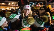 USA's Mikaela Shiffrin greets members of a junior ski team during the Stifel Killington Cup, part of the Audi FIS Ski Women's World Cup, at the Killington Resort in Killington, Vermont, on November 29, 2024. (Photo by Joseph Prezioso / AFP)
