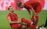 Bayern Munich's English forward #09 Harry Kane (L) speaks with Bayern Munich's German midfielder #06 Joshua Kimmich after an injury during the German first division Bundesliga football match between BVB Borussia Dortmund and FC Bayern Munich in Dortmund, western Germany on November 30, 2024. (Photo by INA FASSBENDER / AFP) 