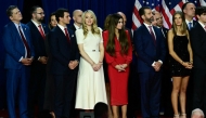 Tiffany Trump and her husband Michael Boulos, Kimberly Guilfoyle, her partner Donald Trump Jr. and his his daughter Kai Madison Trump listen to former US President and Republican presidential candidate Donald Trump speak an election night event at the West Palm Beach Convention Center in West Palm Beach, Florida, early on November 6, 2024. (Photo by Jim WATSON / AFP)