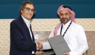 Chief Executive Officer at QFC, Yousuf Mohamed Al Jaida and Chief Executive Officer at CFC, Said Ibrahimi during the MoU signing. 