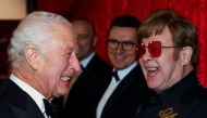 Britain's King Charles III reacts as he meets Elton John as he attends the Royal Variety Performance at the Royal Albert Hall in London on November 22, 2024. (Photo by Toby Melville / POOL / AFP)