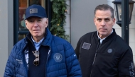 A November 29, 2024 photo shows US President Joe Biden and son Hunter Biden stepping out of a bookstore while shopping in Nantucket, Massachusetts on November 29, 2024. (Photo by Mandel Ngan / AFP)