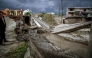 This photograph shows a collapsed bridge in Rhodes island after heavy rainfall, on Decembber 1, 2024. (Photo by Stringer / Eurokinissi / AFP)