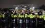 Police stand guard in front of the main gate of the National Assembly in Seoul on December 3, 2024, after South Korea's President Yoon Suk Yeol declared emergency martial law. Photo by Jung Yeon-je / AFP