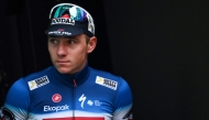 Soudal Quick-Step team's Belgian rider Remco Evenepoel looks on at the podium area after placing second in the 118th edition of the Giro di Lombardia (Tour of Lombardy), a 252km cycling race from Bergamo to Como on October 12, 2024. Photo by Marco BERTORELLO / AFP