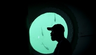 German aerospace engineer Rudiger Koch, 59, is pictured inside an underwater room off the coast of Puerto Lindo, Panama, on November 26, 2024. Photo by MARTIN BERNETTI / AFP