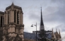 A construction worker walks on scaffoldings on the roof of Notre-Dame de Paris cathedral, a few days before its reopening in Paris, on December 2, 2024. (Photo by Dimitar Dilkoff / AFP)