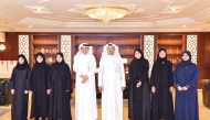 QIIB CEO Dr. Abdulbasit Ahmad Al Shaibei along with officials and students.