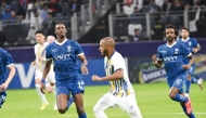 Al Gharafa's Yacine Brahimi (centre) in action during the match against Al Hilal SFC in Riyadh yesterday.