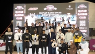 QRC Director H E Sheikh Jabor bin Khalid Al Thani poses with the winners of Qatar Sand Drag Competition Round 3. 